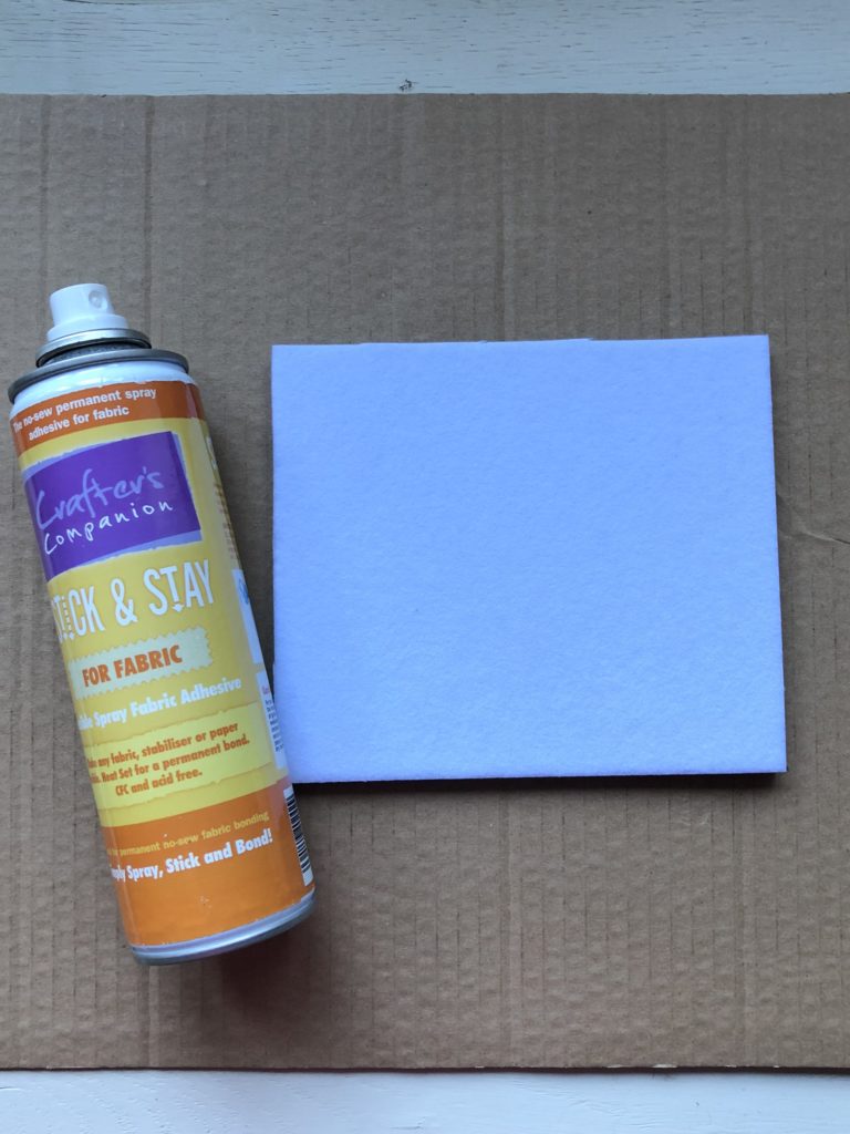 spray glue and foam used for making a distressed painted picture frame