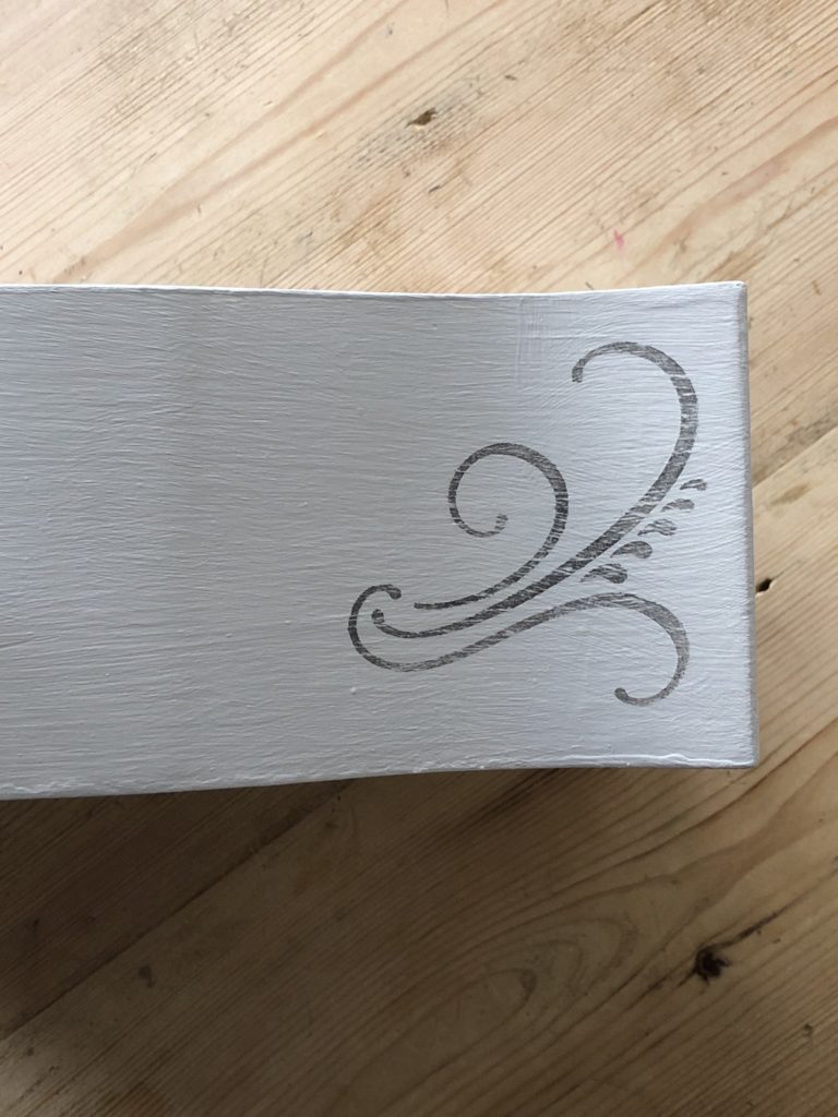 stenciled scroll on painted drawer