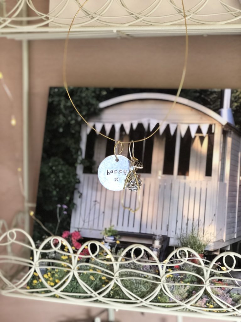 Metal Stamping - finished metal happy decoration with fairy lights and photo of shepherds hut