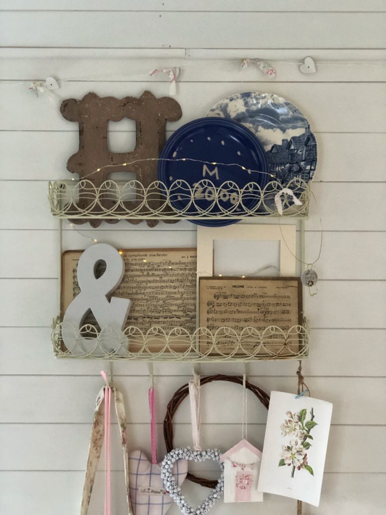 wire shelves full of decorative ornaments