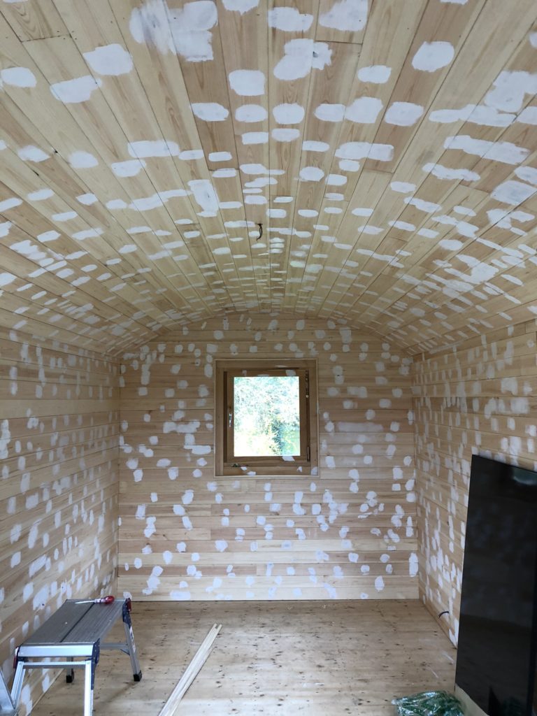 Knotting a pine clad shepherds hut