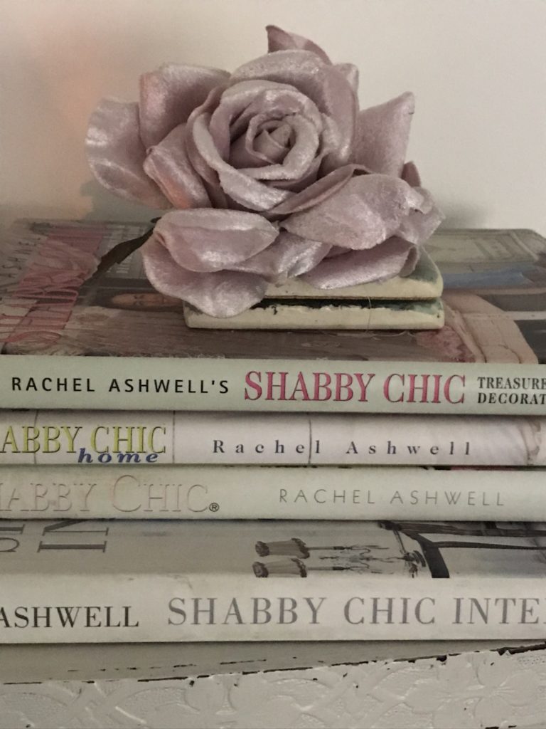 Rachel Ashwell's Shabby Chic books and pink faux rose