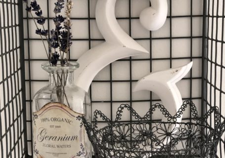 wire shelves with ampersand, bottle and wire basket