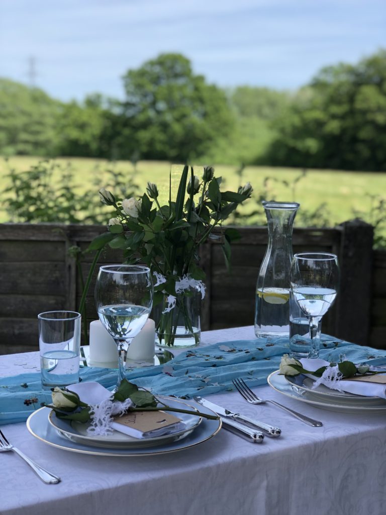 Summer alfresco dining overlooking green fields