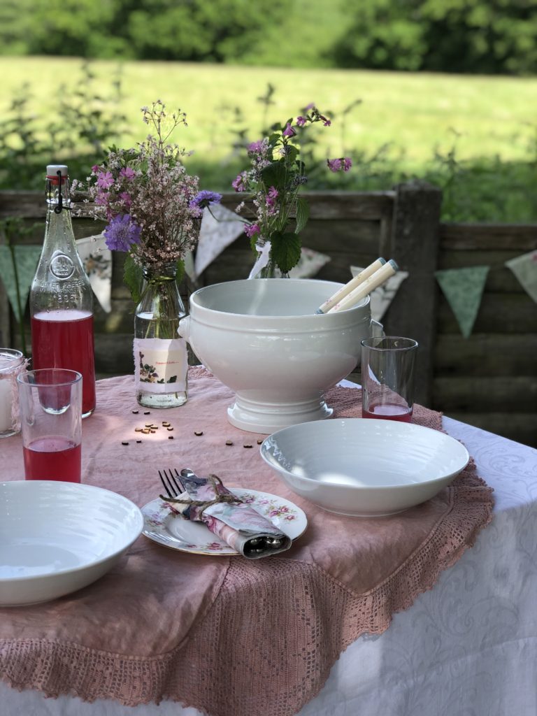 shabby chic pink themed simple table decoration for outdoor lunch table