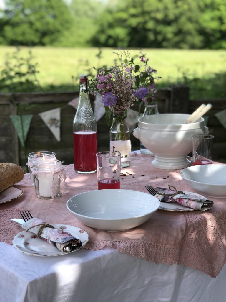 shabby chic pink themed simple table decoration for outdoor lunch table