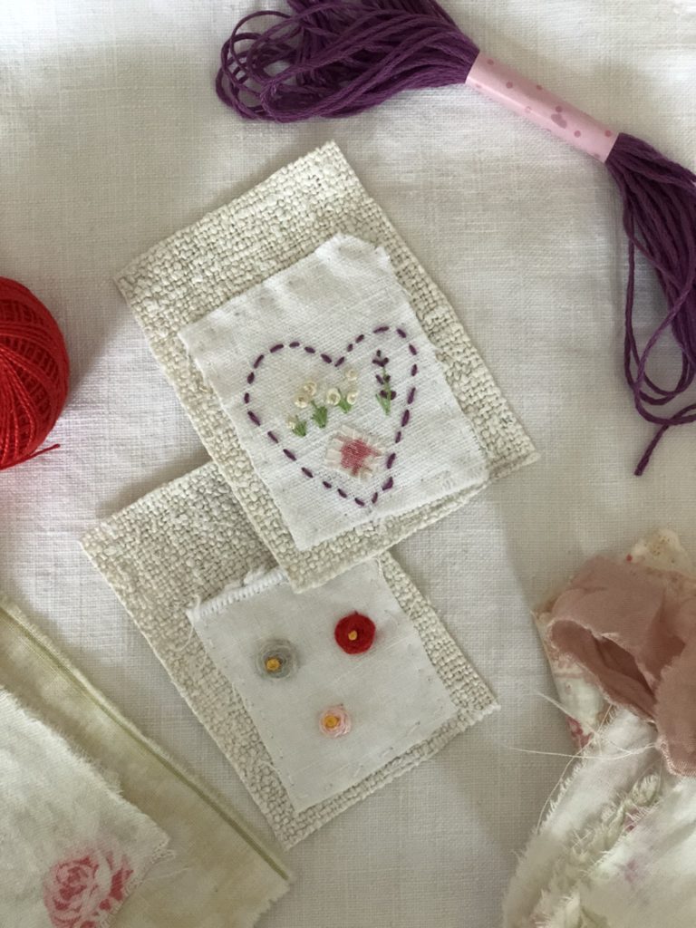 embroidered fabric heart and roses on french sack material