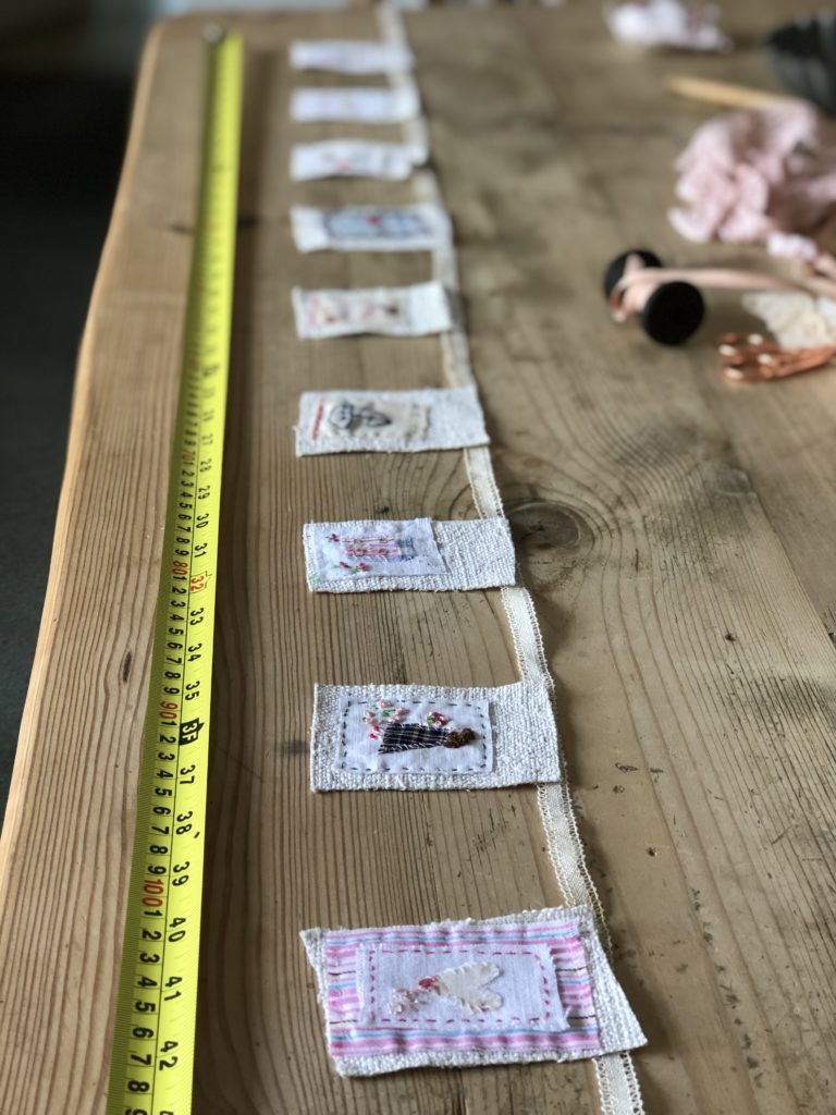 tape measure measuring length of  mini fabric bunting