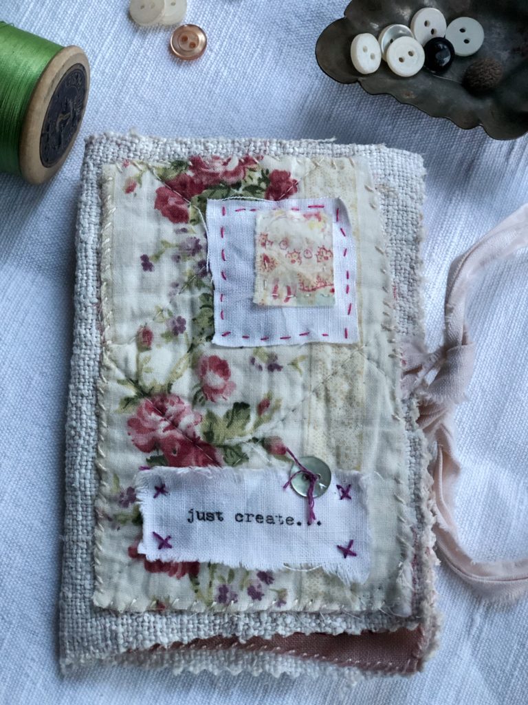 cover of pretty hand stitched needle case