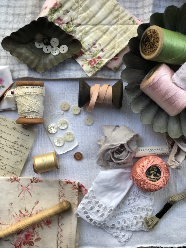 flat lay of vintage sewing notions and haberdashery