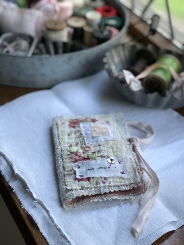 cover of pretty hand stitched needle case