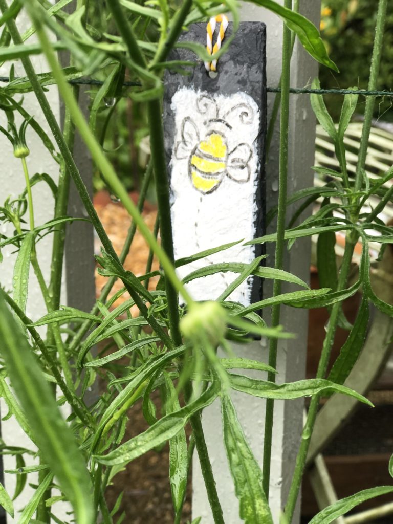 bee slate plant marker in the cottage garden