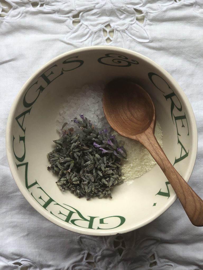 flatlay of lavender, salt and milk powder in Emma Bridgewater bowl and wooden spoon