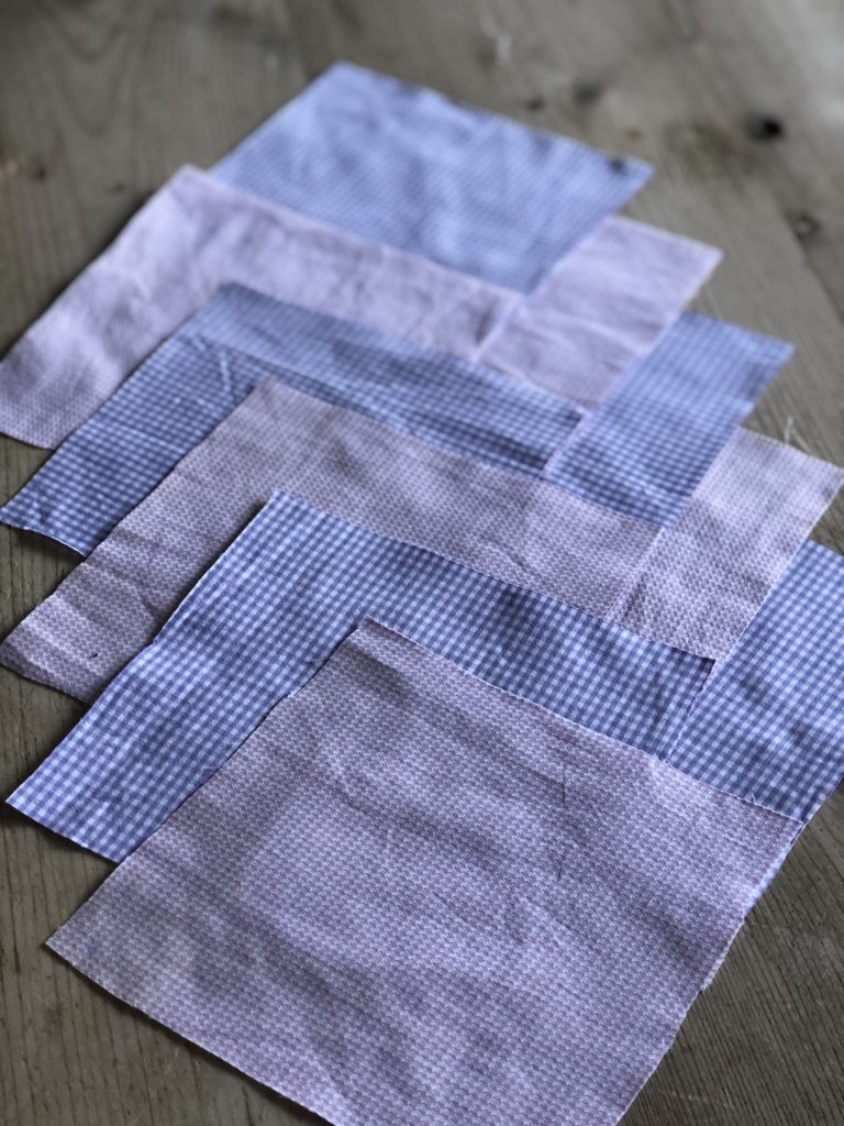 purple and pink gingham fabric squares