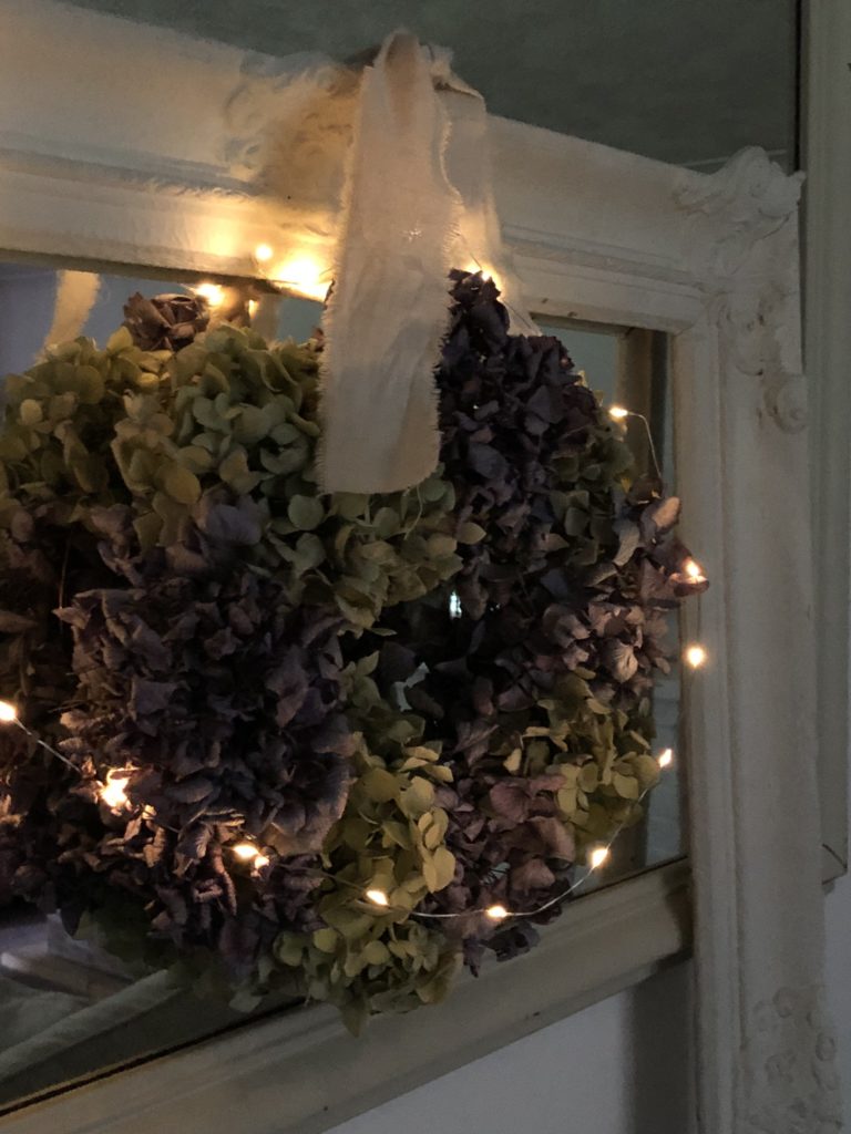 homemade autumn hydrangea wreath with fairy lights