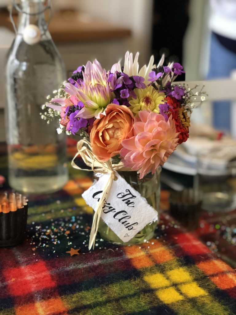 The Cozy Club vase of colourful autumn flowers