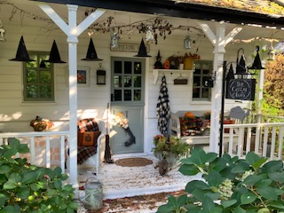 front porch of house dressed for halloween