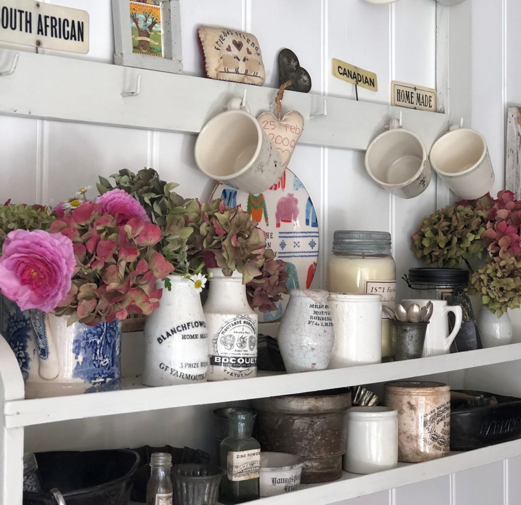 kitchen shelf with vintage treasures