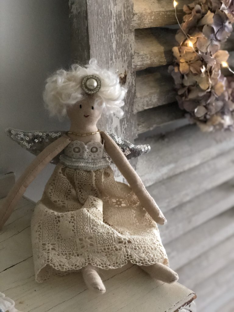 pretty heirloom fairy against  rustic shutters