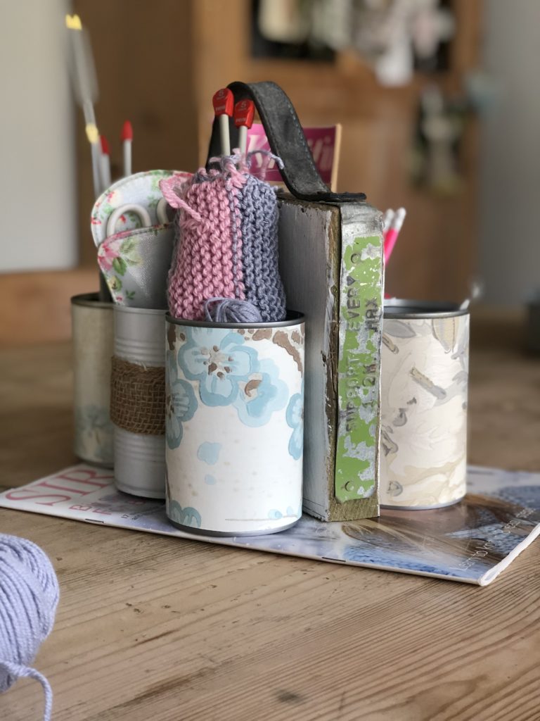 tin can caddy holds knitting needles and wools