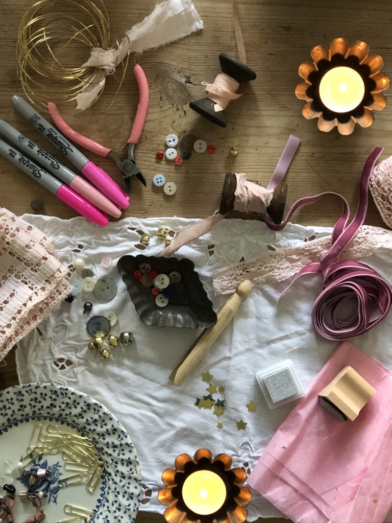 Flatlay of craft items and tealights