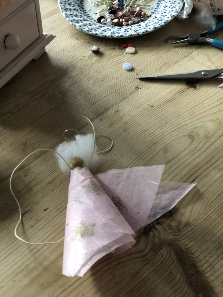 making a pink paper skirt for peg doll fairy