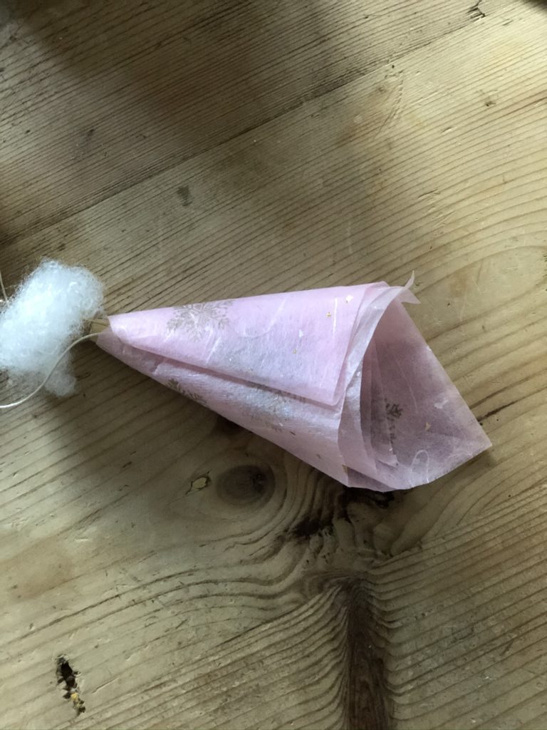 making a pink paper skirt for peg doll fairy