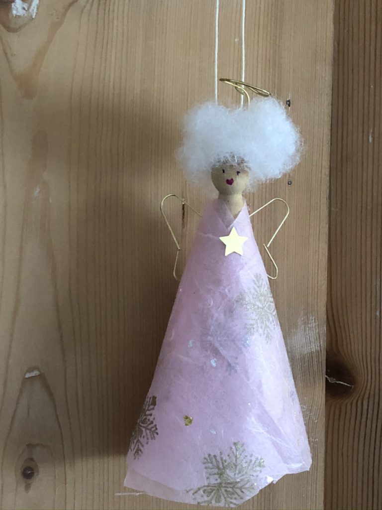 pink peg doll fairy with lots of white hair