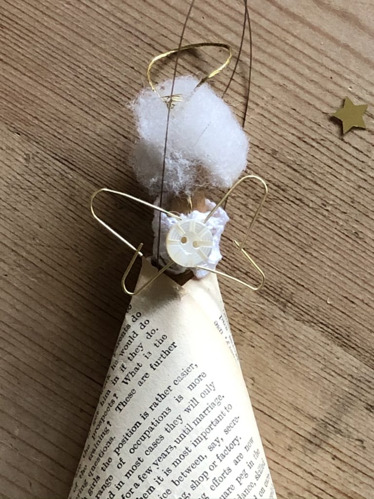 reverse of peg doll fairy with wire wings and button detail