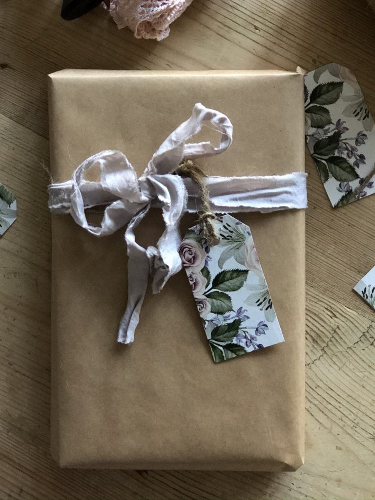 vintage bows and gift tags with brown paper gift wrapping