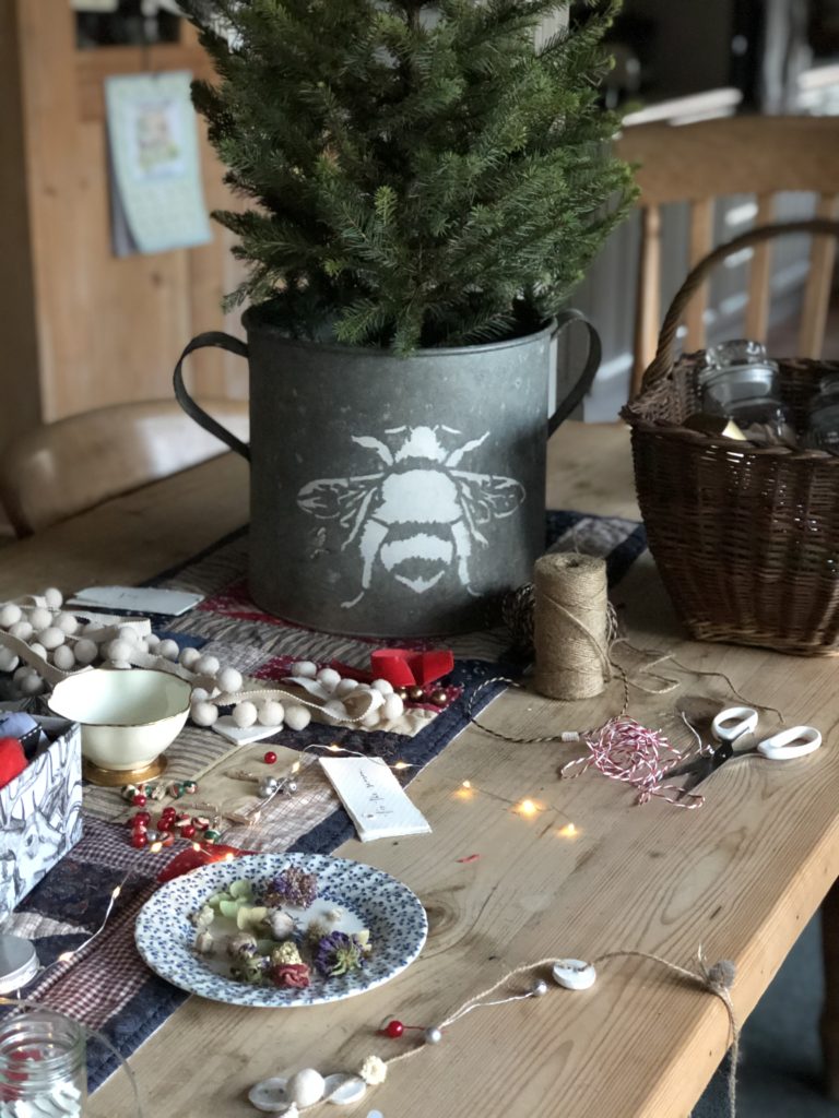 selection of christmas craft supplies to make homemade rustic decorations