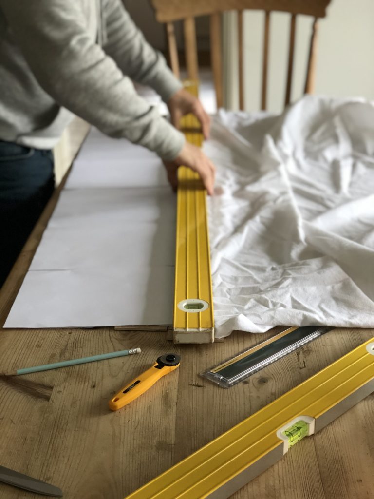 cutting fabric and using spirit level