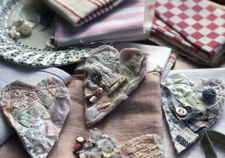 four vintage fabric brooches