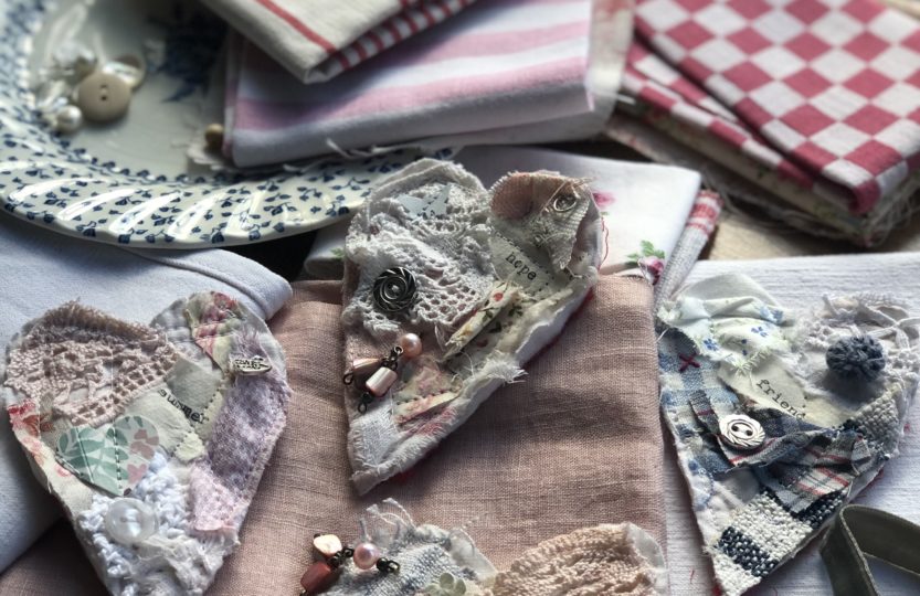 four vintage fabric brooches