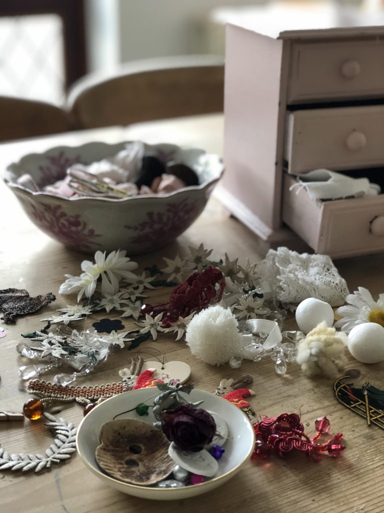 sewing embellishments and pink drawers and bowl