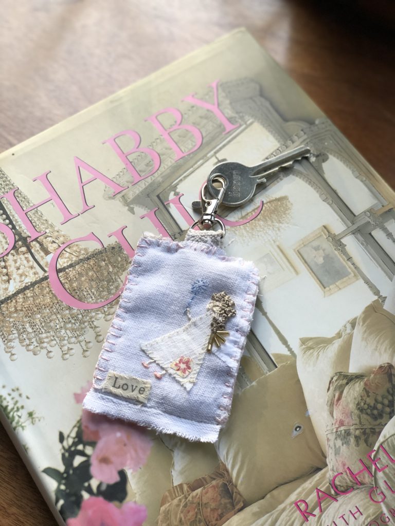 Shabby Chic book with angel motif fabric key ring