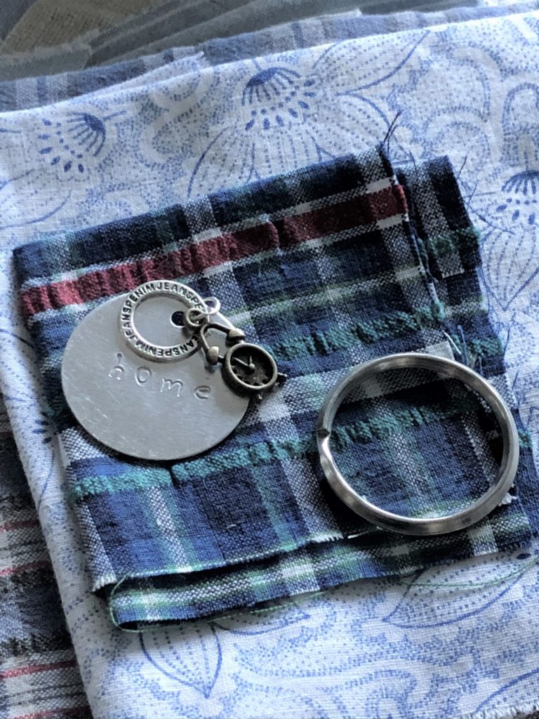 making and stamping a  metal key ring