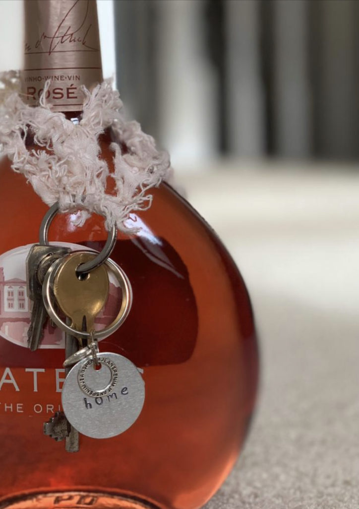 homemade metal key ring on rose wine