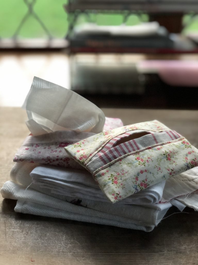 two homemade fabric pocket tissue holders