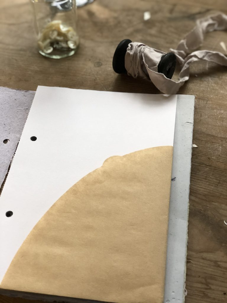 coffee filter forms a pocket on paper