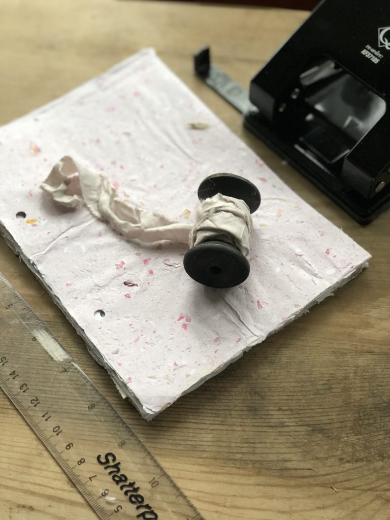 handmade papers and vintage ribbon for junk journal