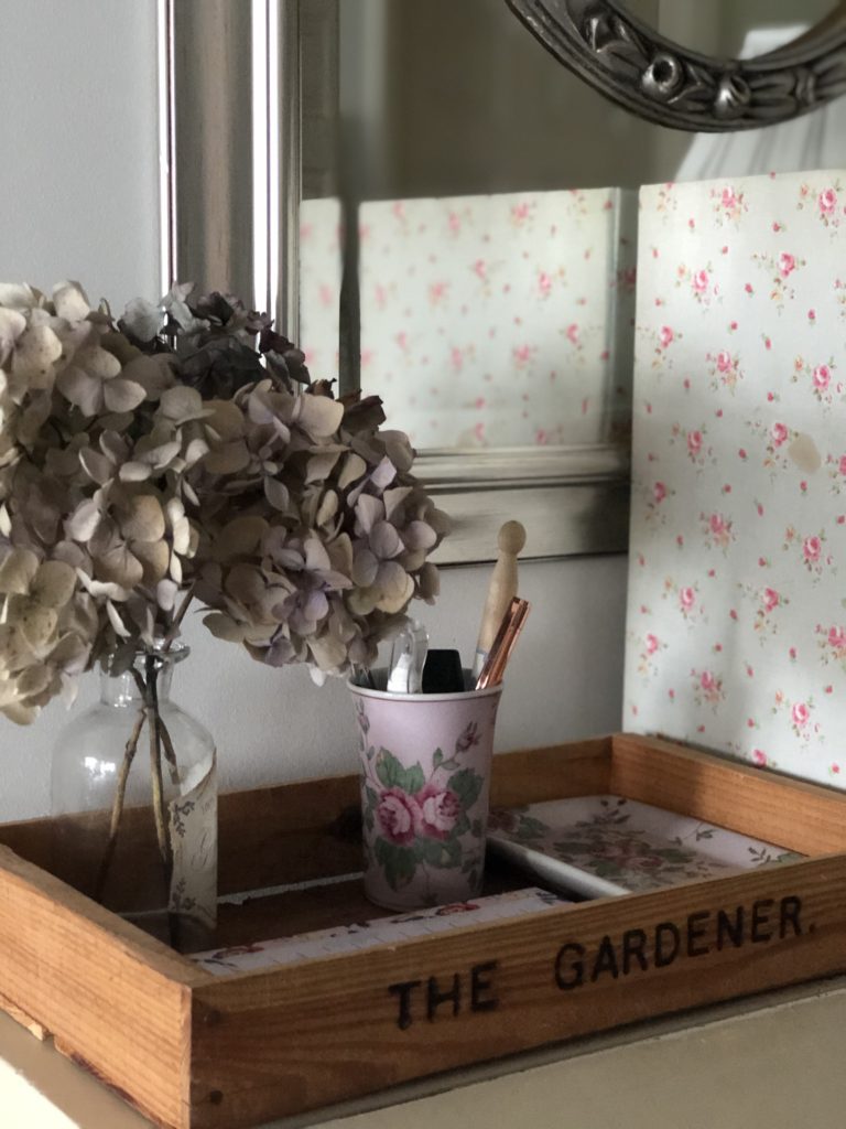 wooden seed tray with dried hydrangeas