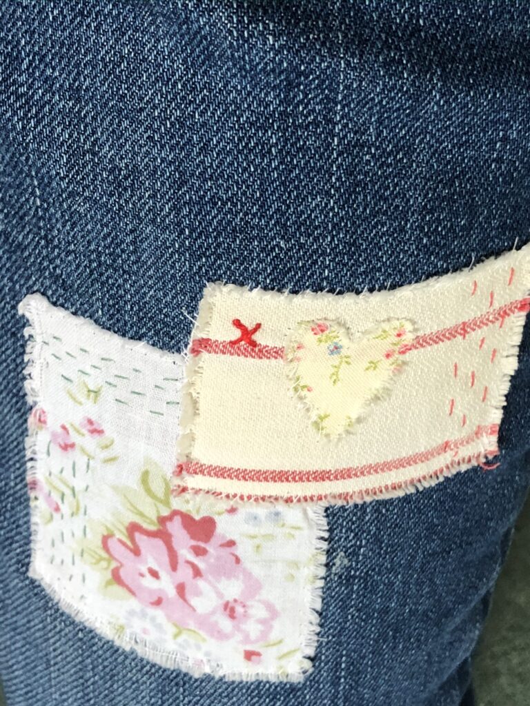 patching jeans with vintage fabric