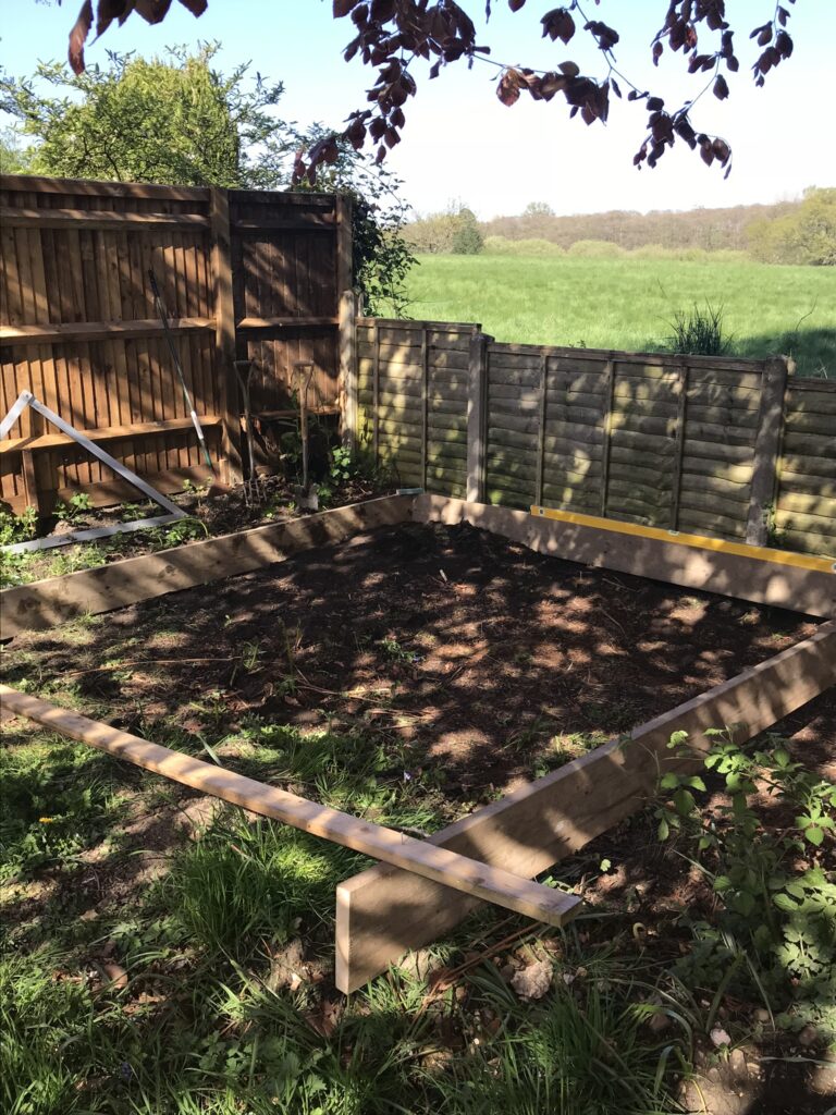 preparing the ground for a small garden terrace