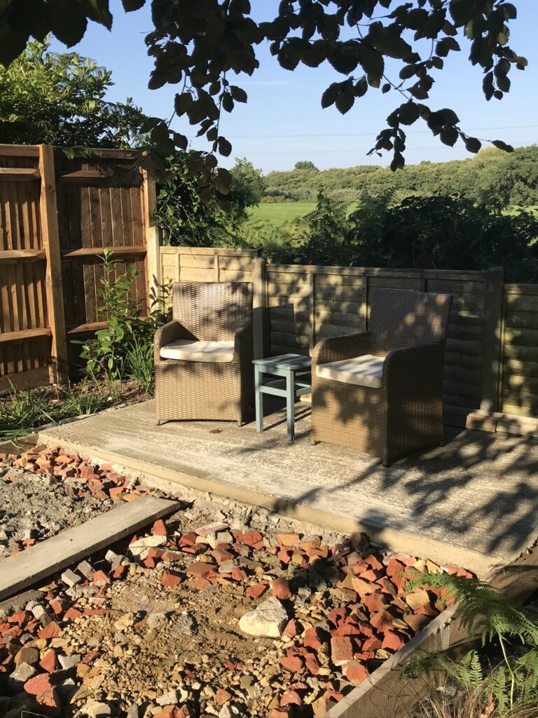 partial completion of small garden terrace on a budget