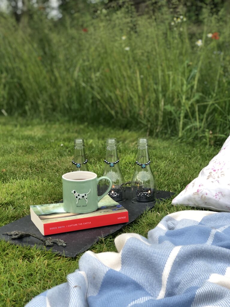 coffee and book with diy glass candle centrepiece