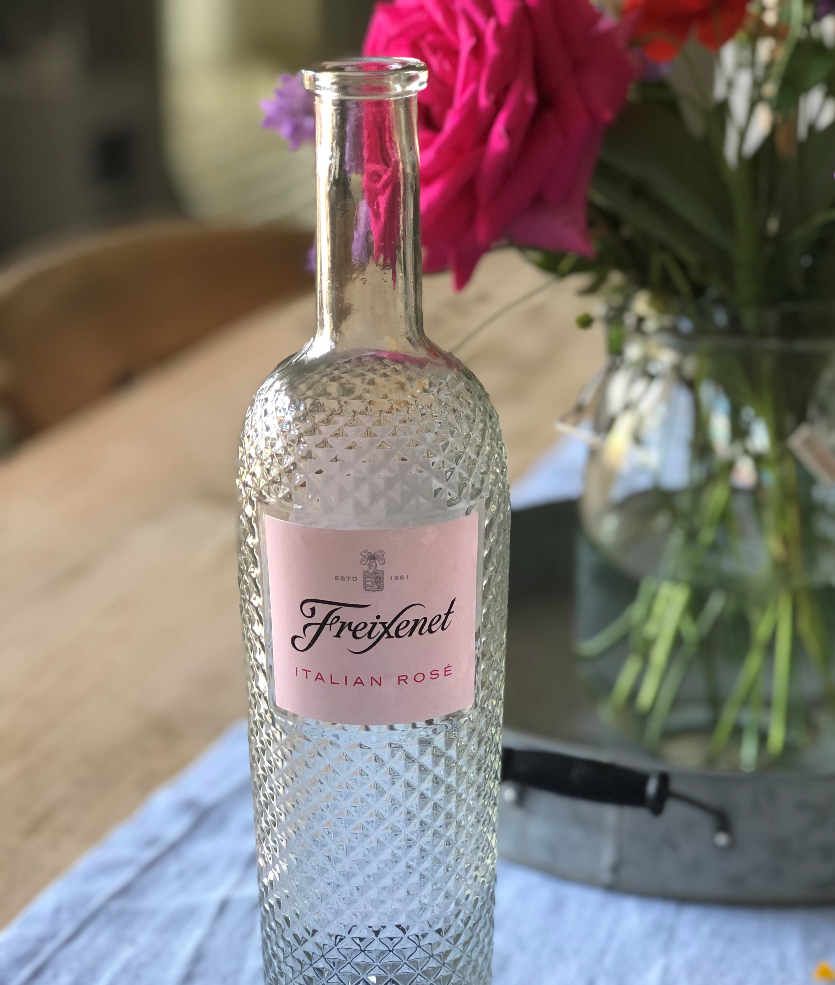 Empty bottle of Frexinet wine