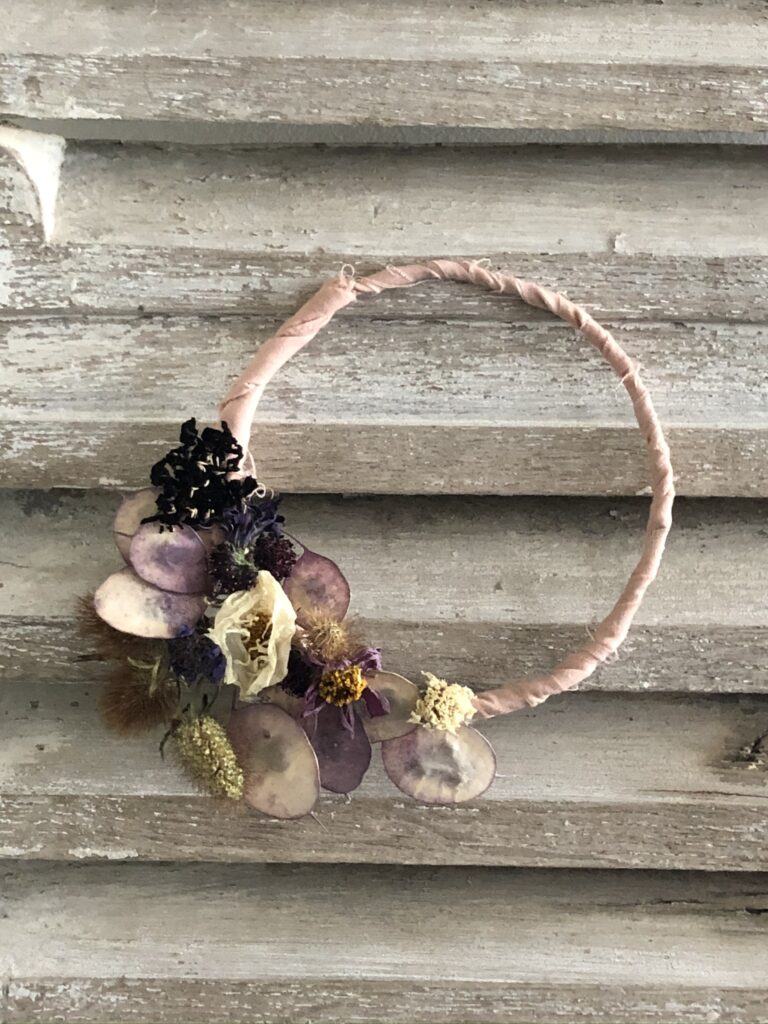 a beautiful mini dried flower hoop