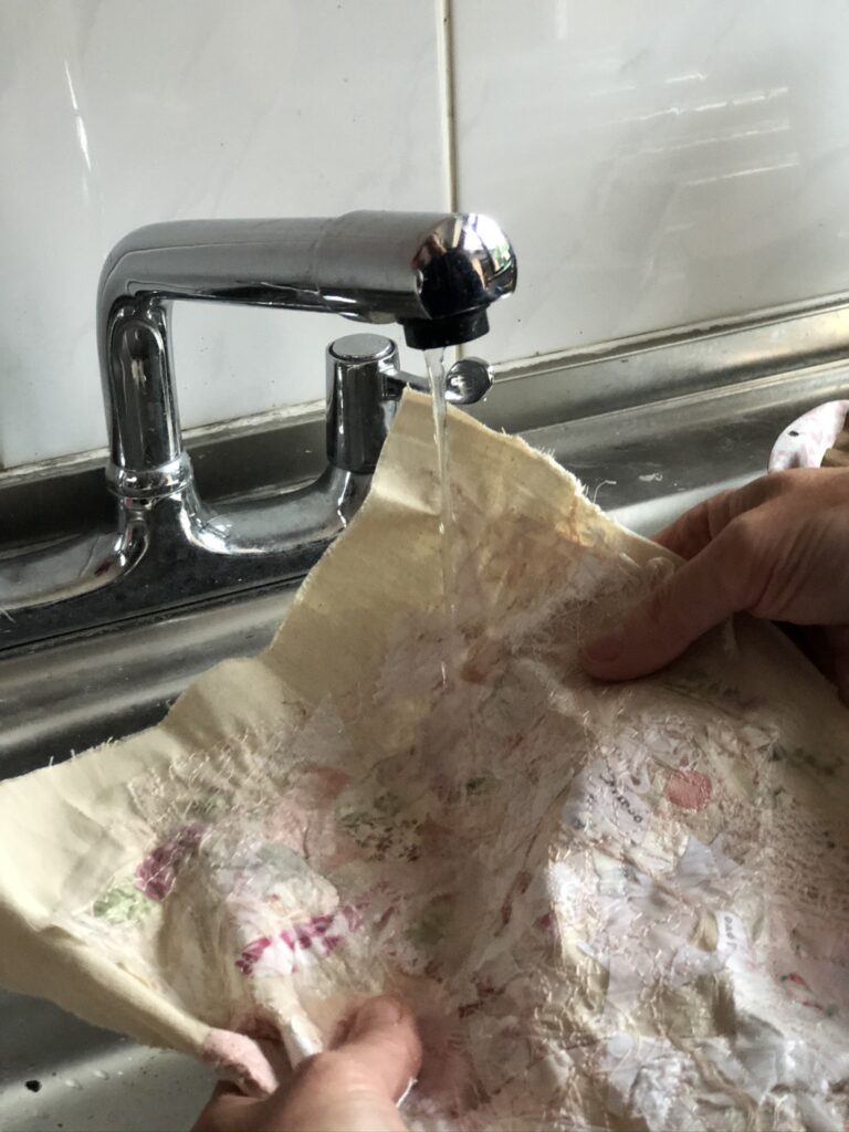 rinsing of water soluble fabric