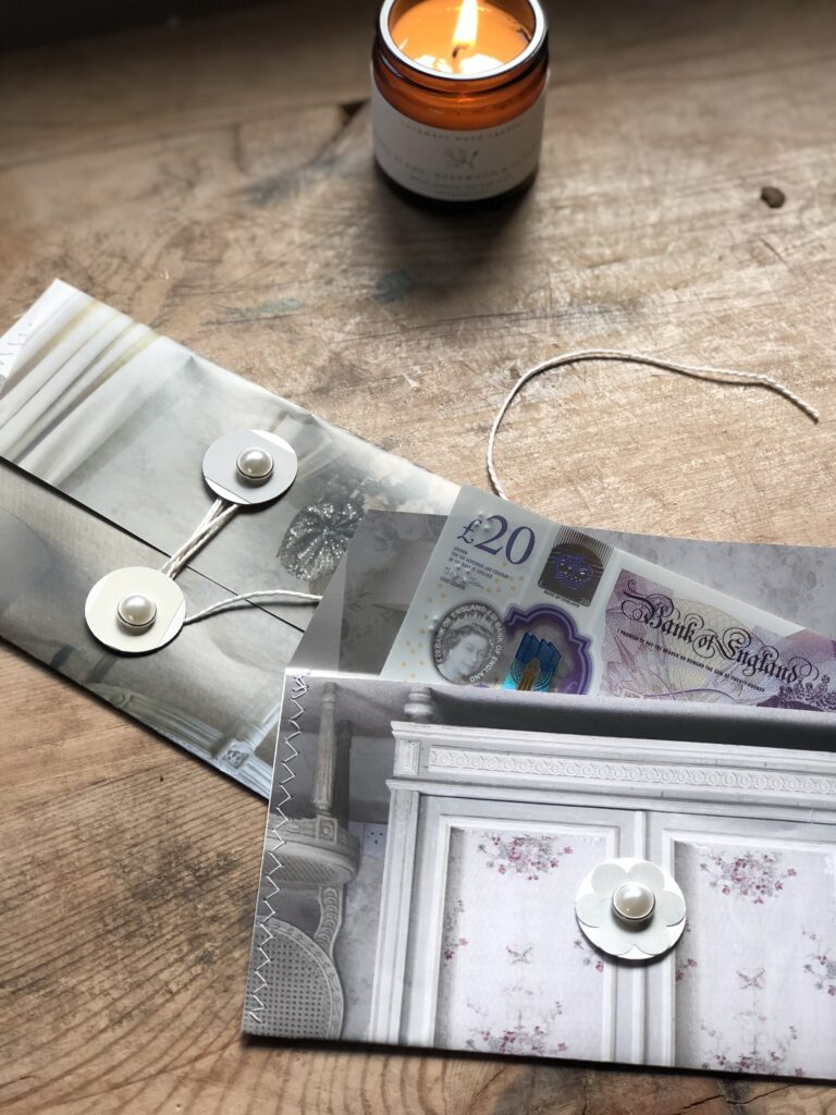 cash and handmade paper money pouches